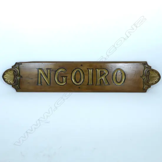 An old carved kauri ship's name plaque