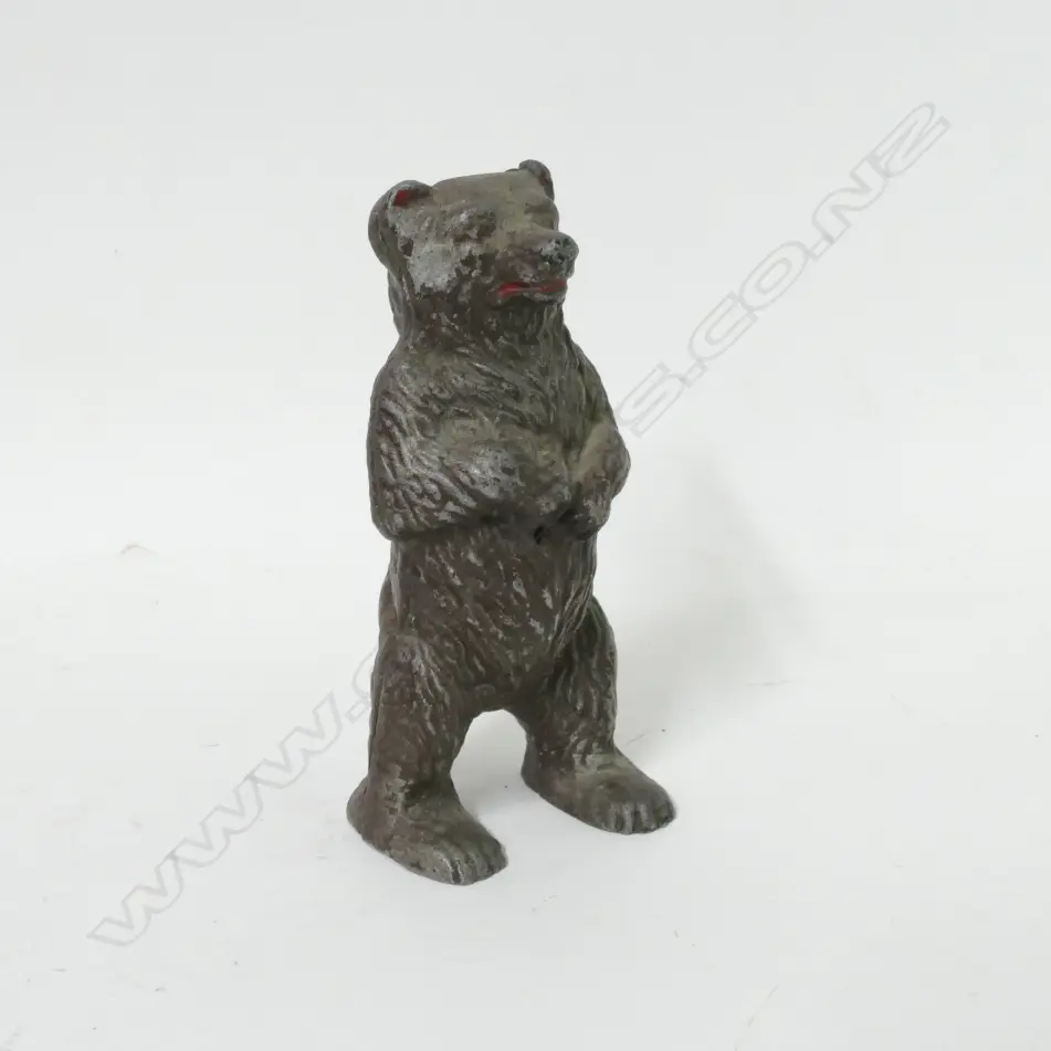 A vintage cast aluminium bear money box Image 1++
