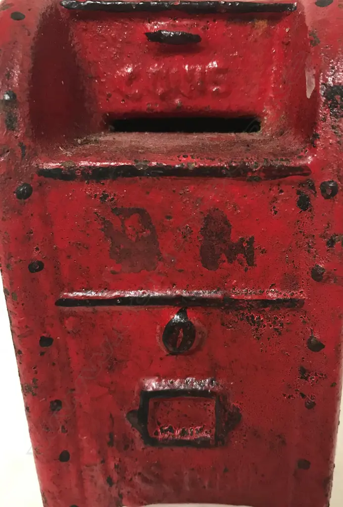 An old cast iron money box Image 1++