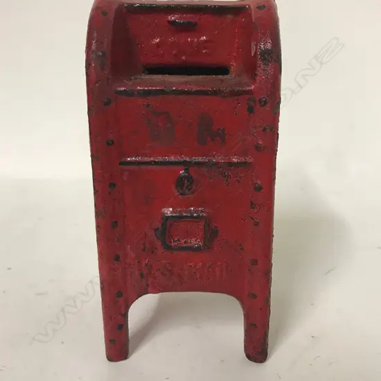 An old cast iron money box