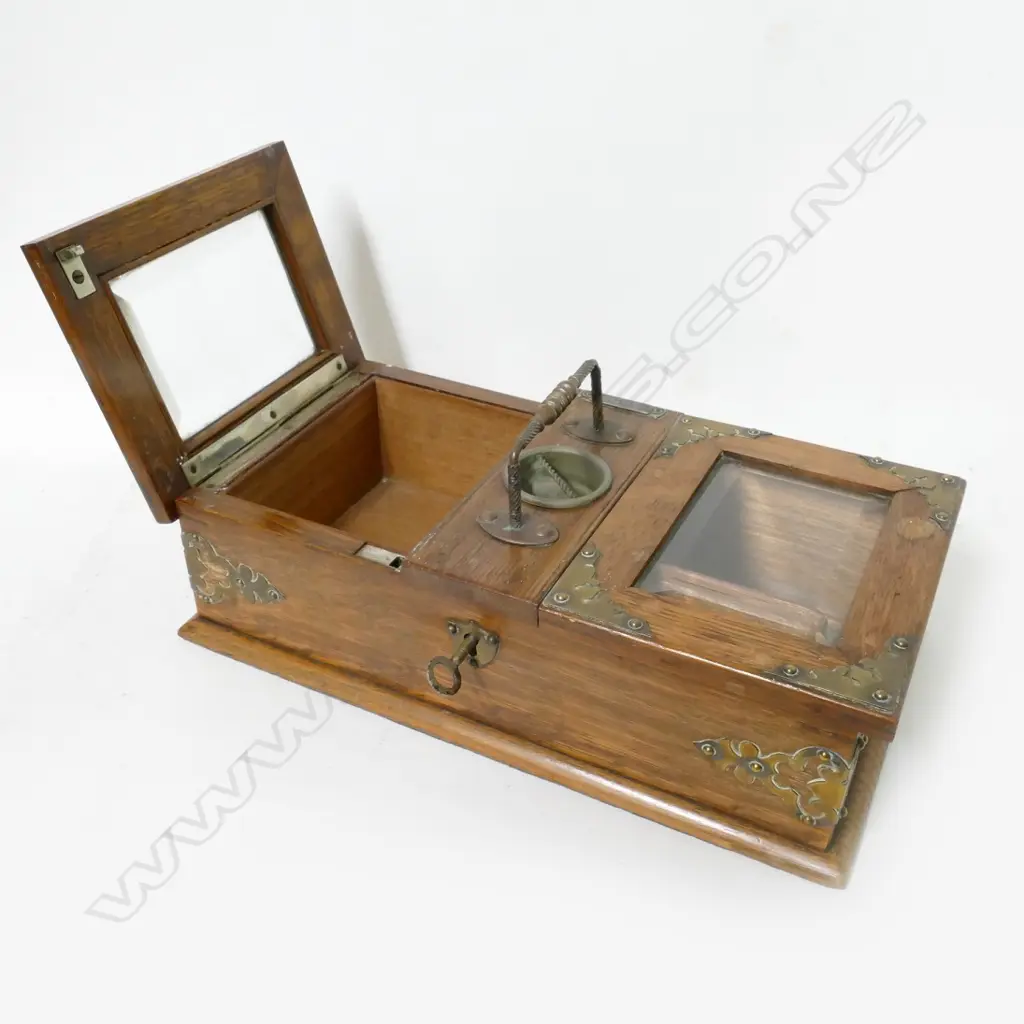 A late Victorian oak smoker's cabinet Image 1++