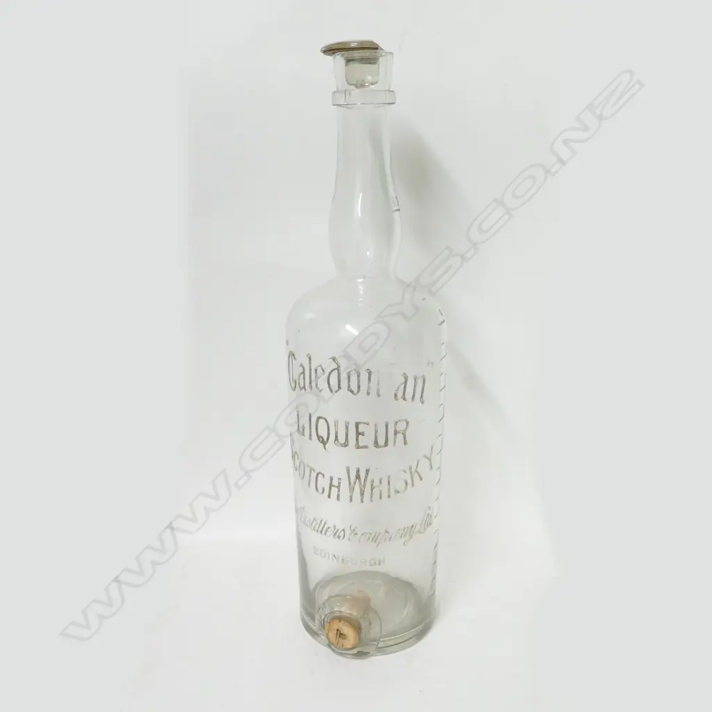 An old bar whisky dispenser Image 1++