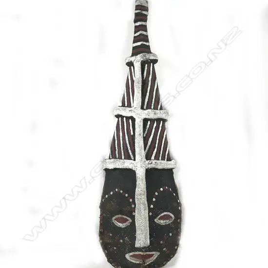 An African painted and woven fibre tall helmet mask