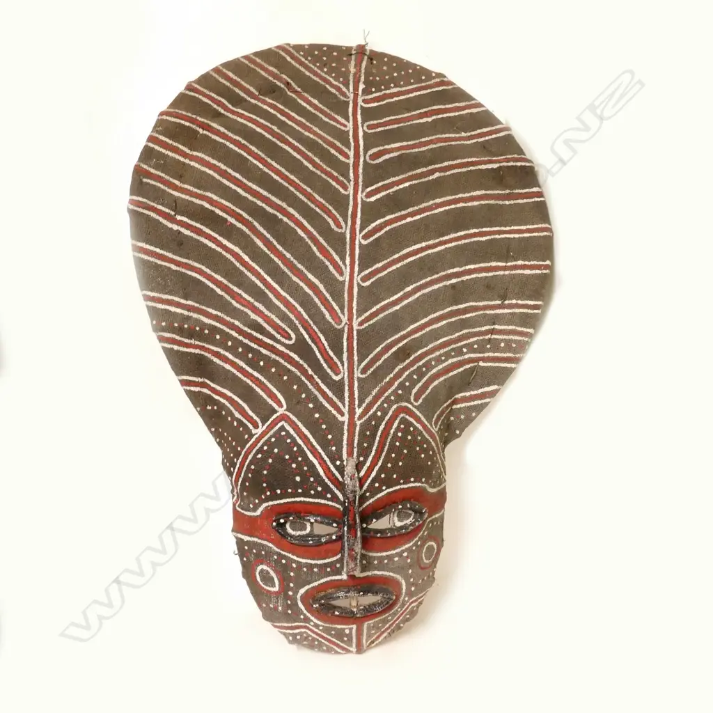 A Cameroons painted basket weave mask Image 1++