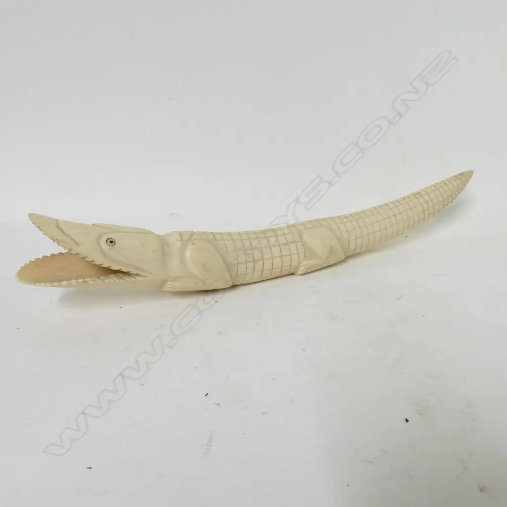 An African ivory tusk carved as a crocodile Image 1++