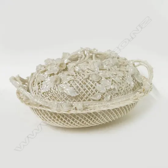 An ornate porcelain Belleek lidded basket