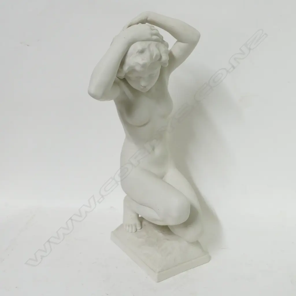 A Hutschenreuther bisque figurine of a young kneeling woman Image 1++