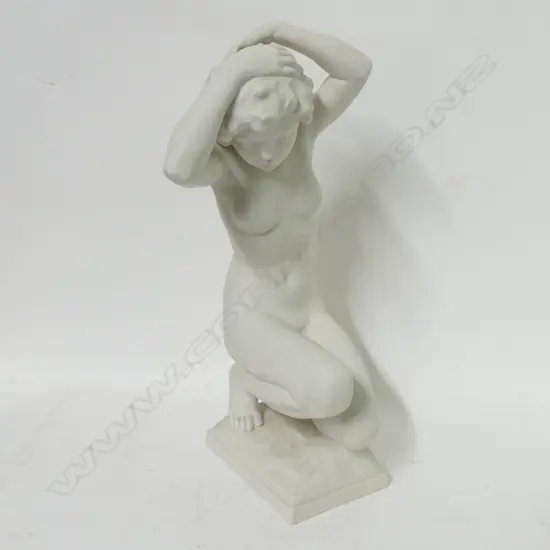 A Hutschenreuther bisque figurine of a young kneeling woman