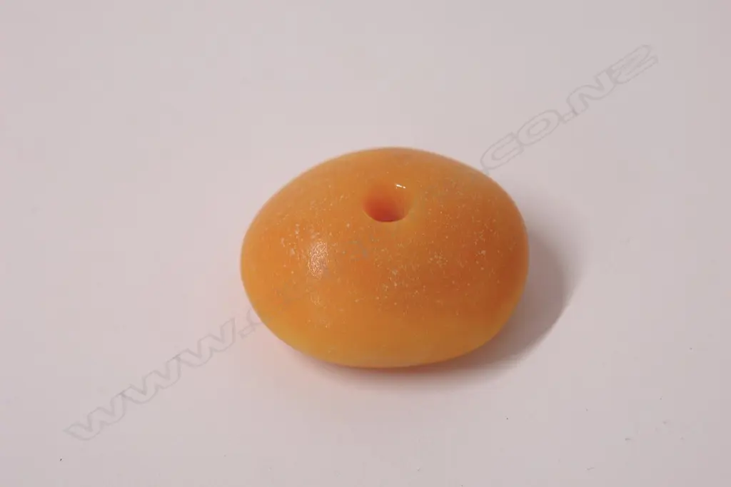 A large amber bead Image 1++