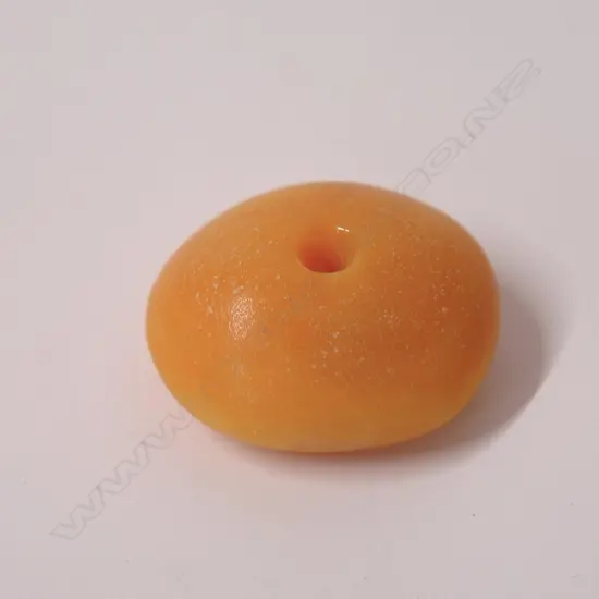 A large amber bead