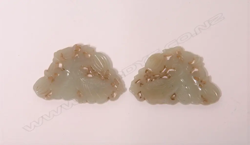 A pair of Chinese carved jade small panels Image 1++