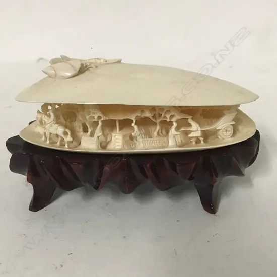 A Chinese carved ivory dream shell