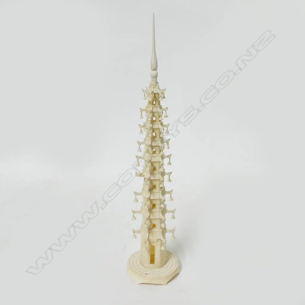 An ivory carving in the form of a tall pagoda Image 1++
