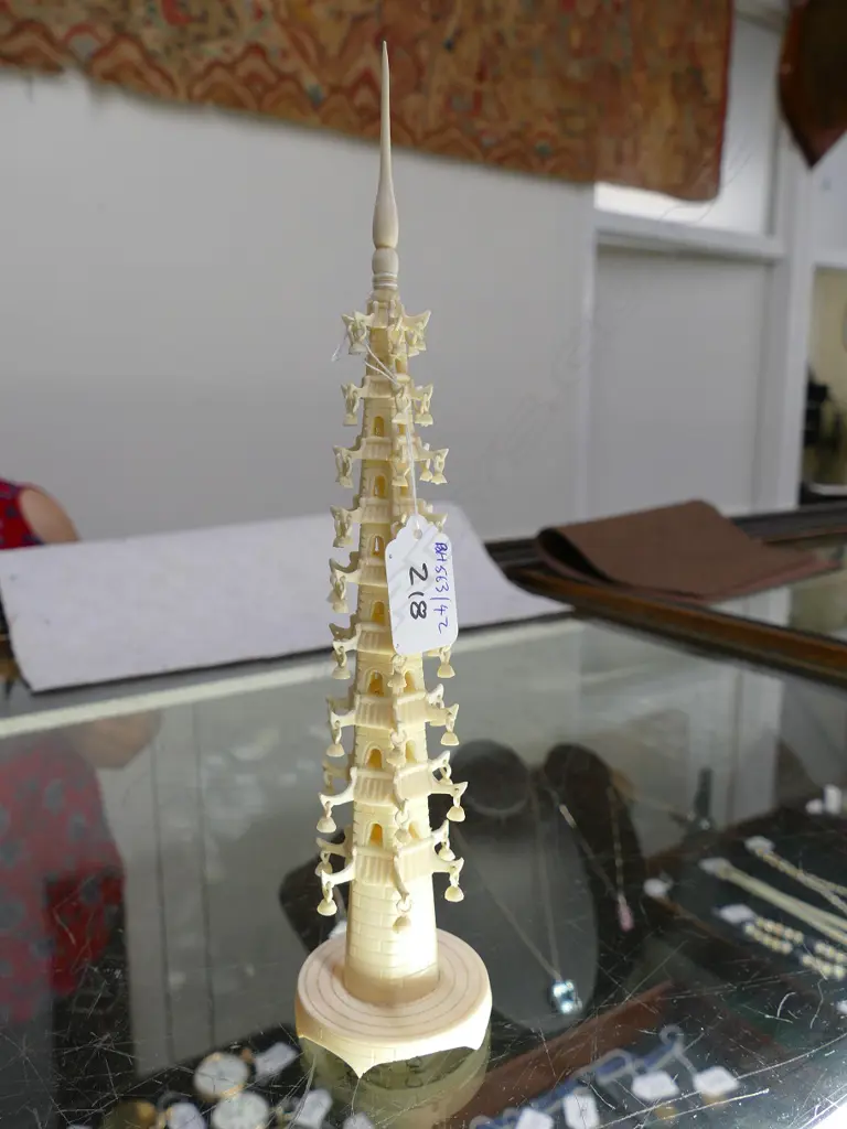 An ivory carving in the form of a tall pagoda Image 1++