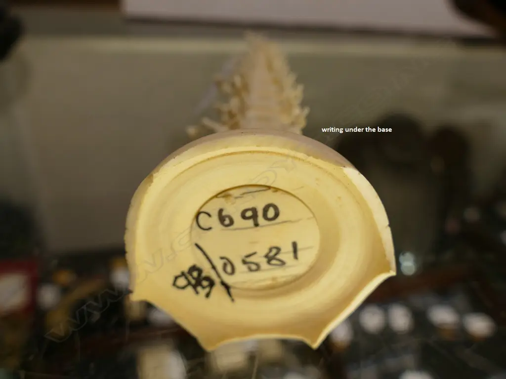 An ivory carving in the form of a tall pagoda Image 1++