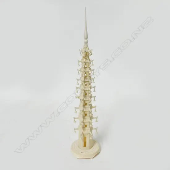 An ivory carving in the form of a tall pagoda