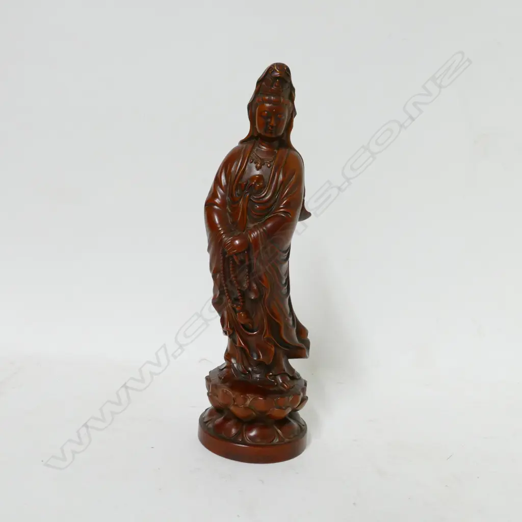A carved figure of Kuanyin Image 1++