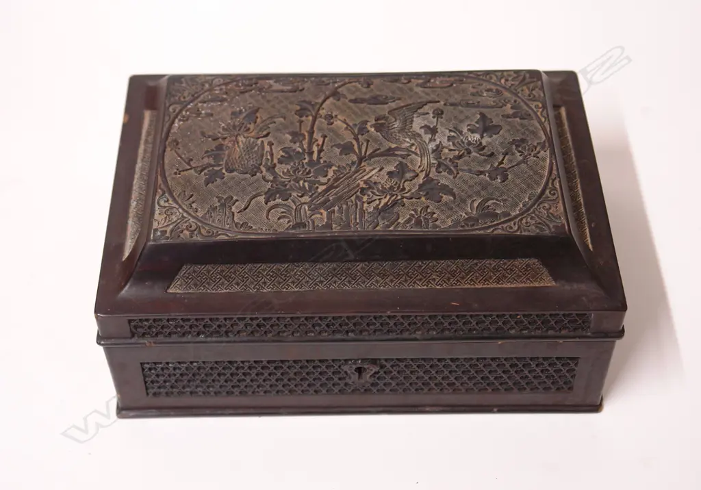 A late 19thC Oriental black lacquer finely decorated tea caddy Image 1++