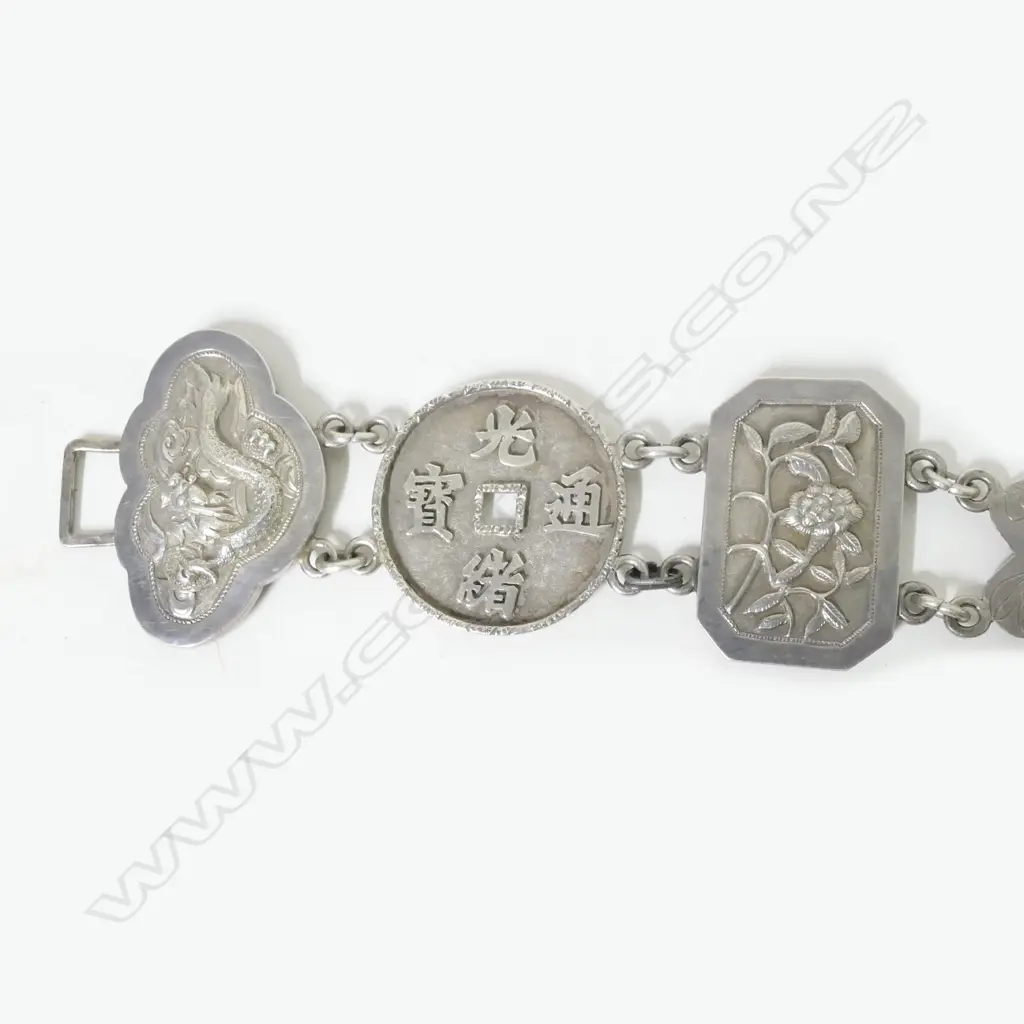 A Chinese silver belt of 15 panels joined by chained links Image 1++