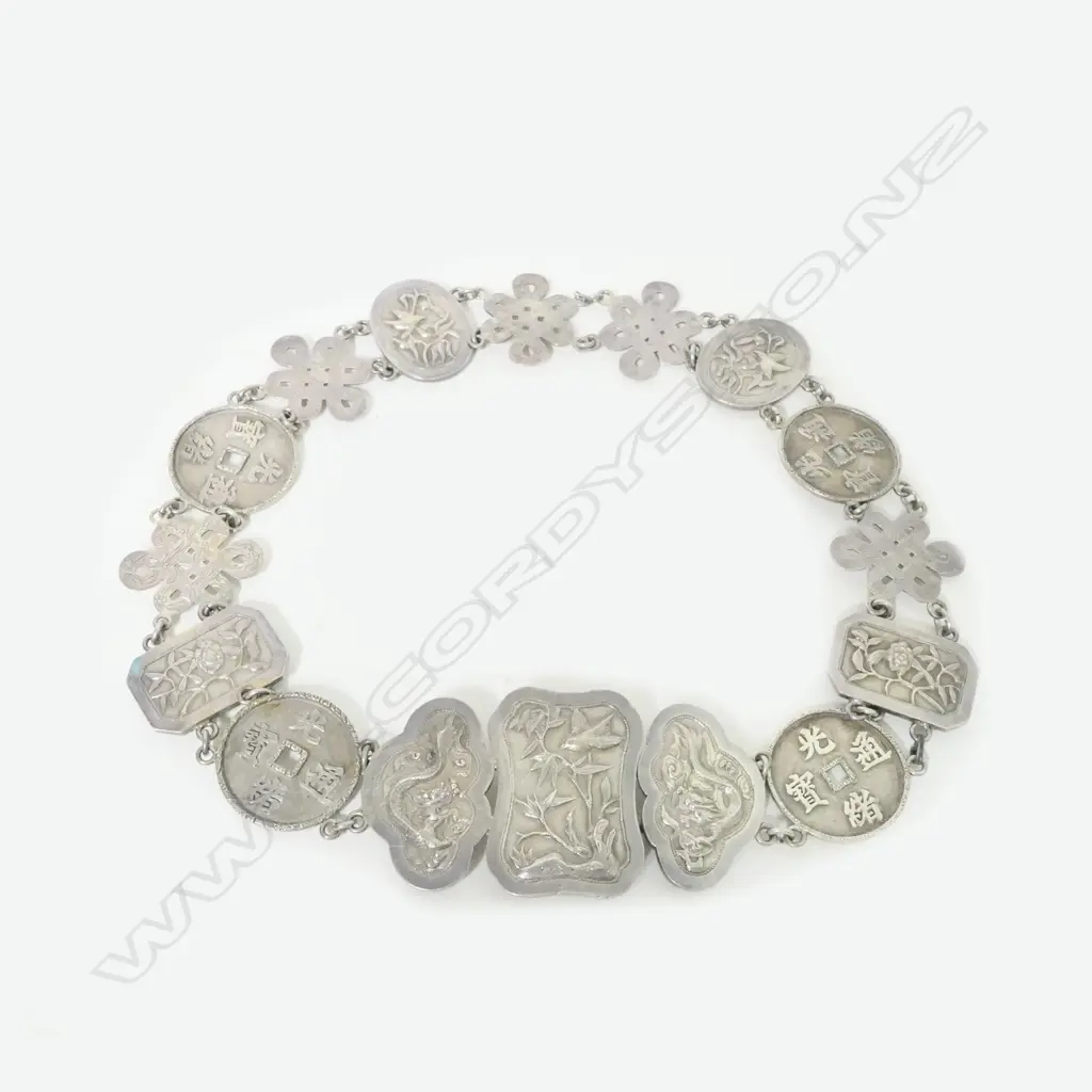 A Chinese silver belt of 15 panels joined by chained links Image 1++