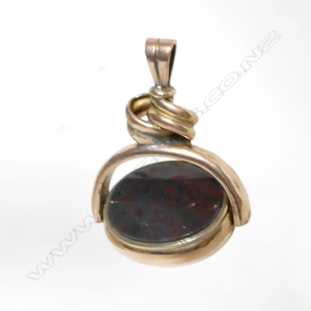 A 10ct. gold fob spinner Image 1++