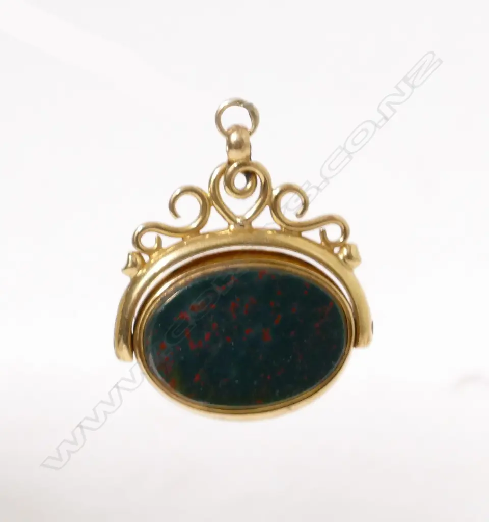 An 18ct. gold and bloodstone fob spinner Image 1++