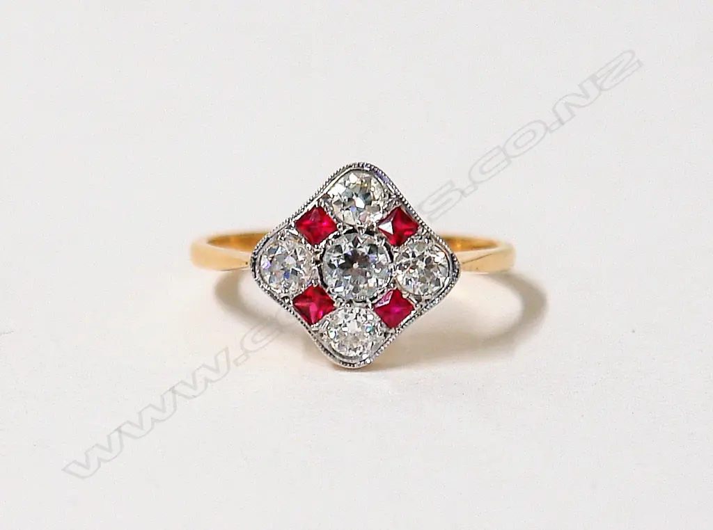 A lady's English made Art Deco style 18ct. diamond and ruby dress ring Image 1++