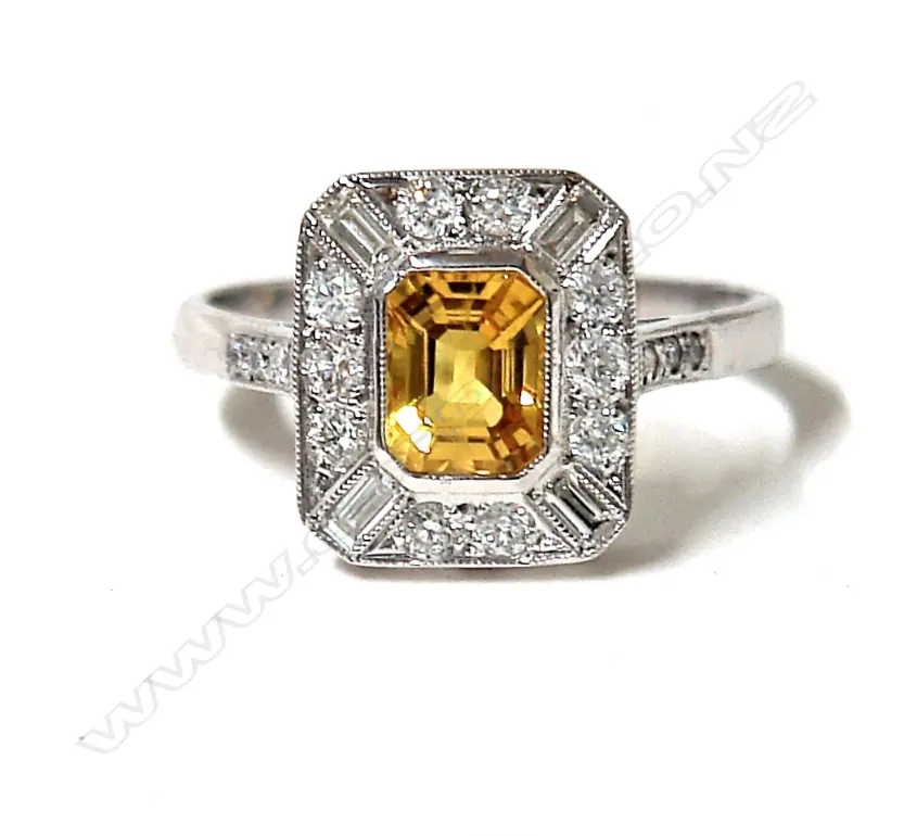 A lady's 18ct. yellow sapphire and diamond cluster ring in the Art Deco manner Image 1++