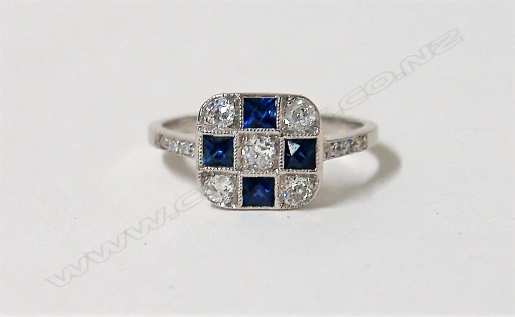 A lady's 18ct. Art Deco style diamond and sapphire cluster ring Image 1++