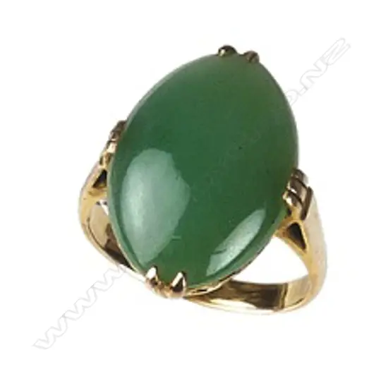 A 14ct. gold and jade ring