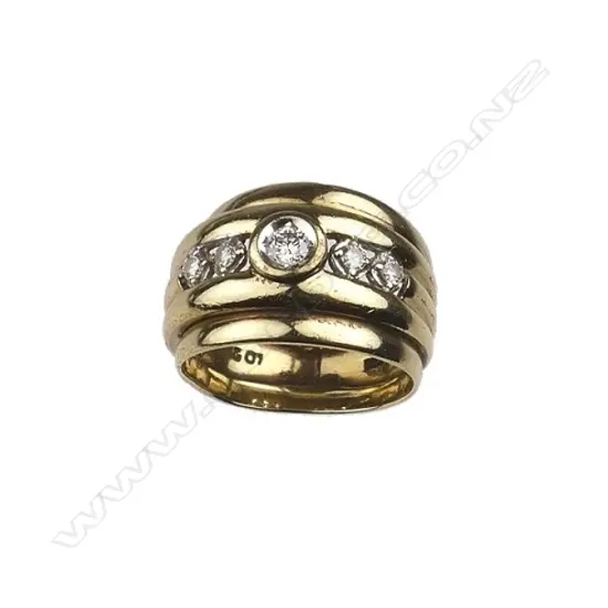 A 9ct. yellow gold set of three joined rings