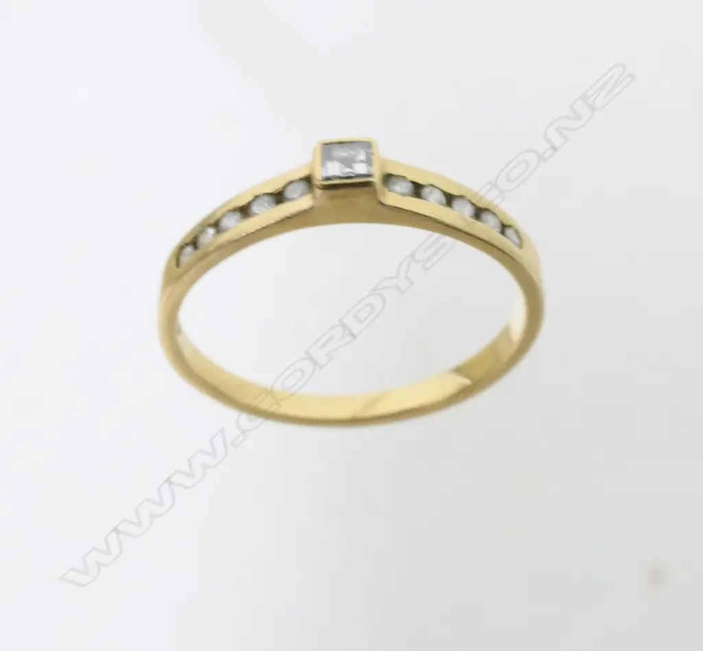 Two 18ct. gold and diamond rings Image 1++