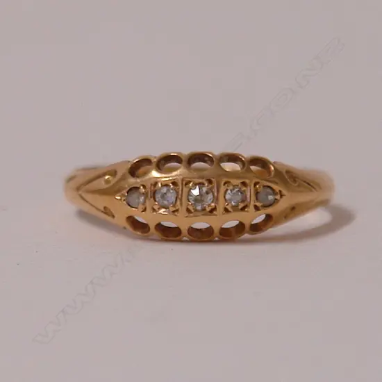 A lady's estate 18ct. yellow gold and five stone diamond ring