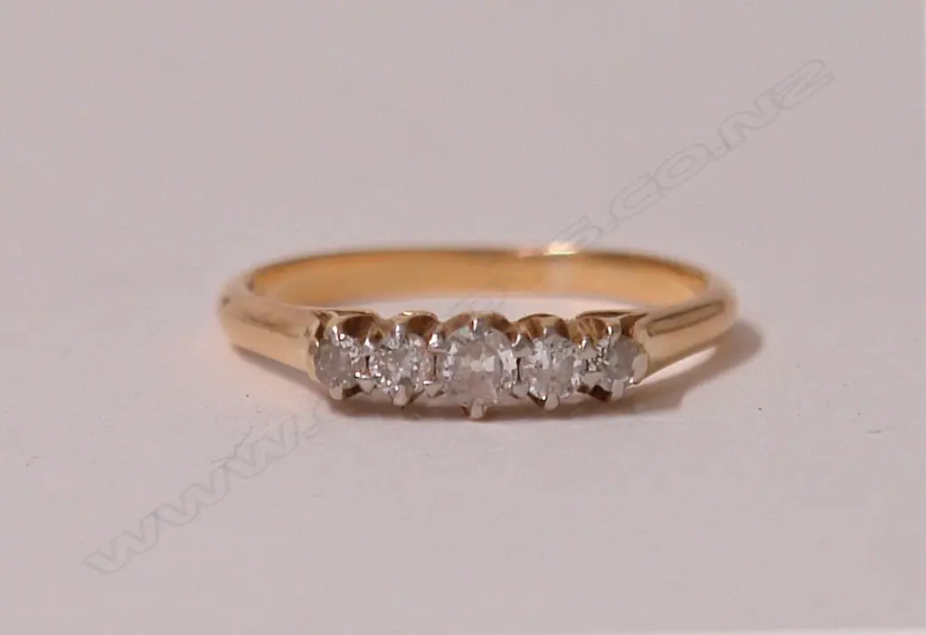 A lady's estate 18ct. yellow gold and five stone diamond ring Image 1++