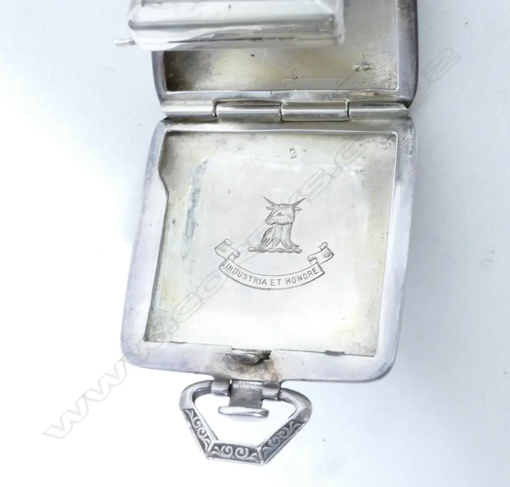 An Art Deco German silver cased miniature travelling clock Image 1++