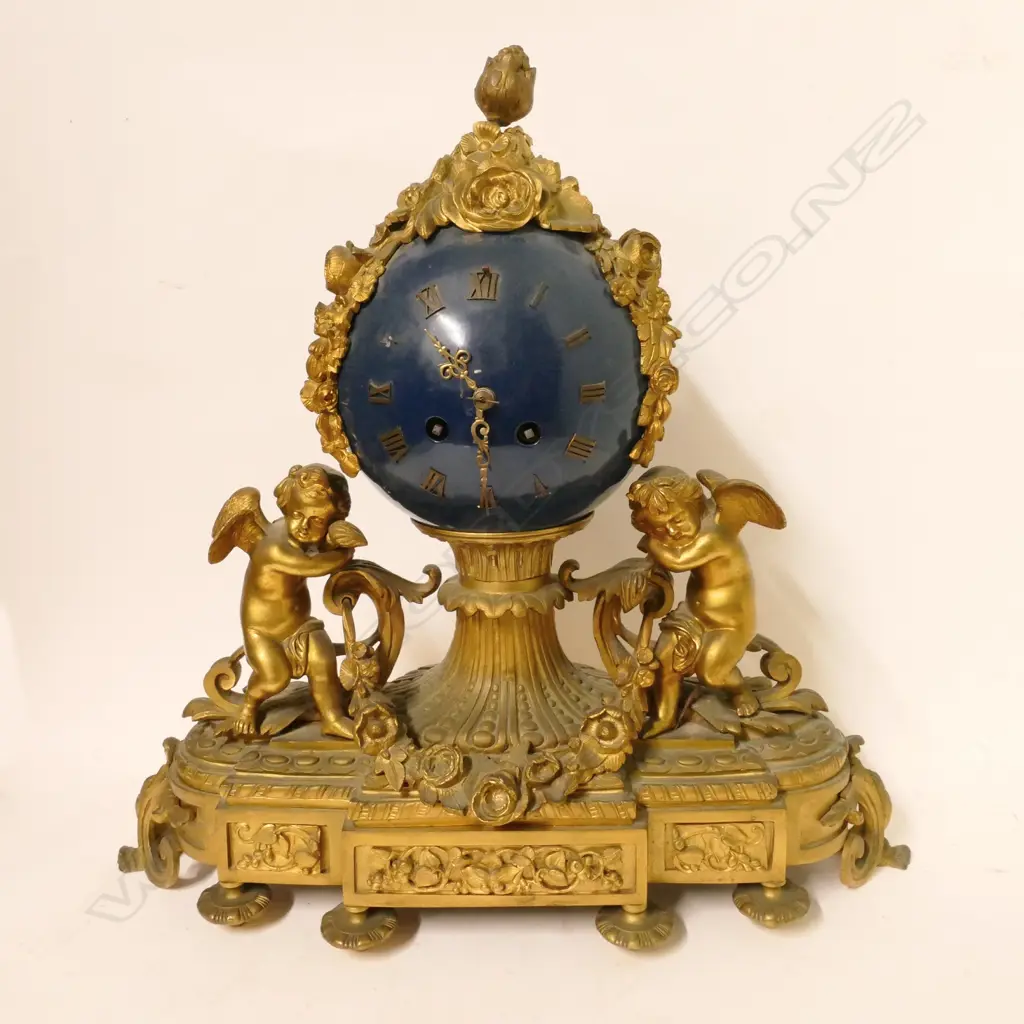 A 19thC French gilt sculptural mantel clock Image 1++
