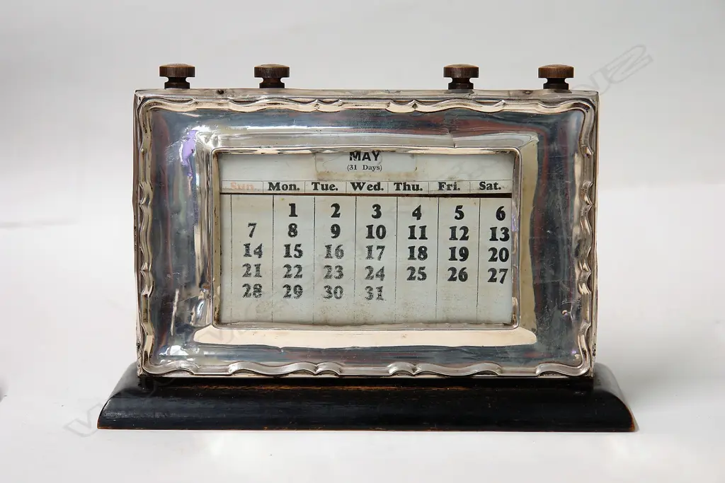 A 1930s silver fronted desk calendar Image 1++