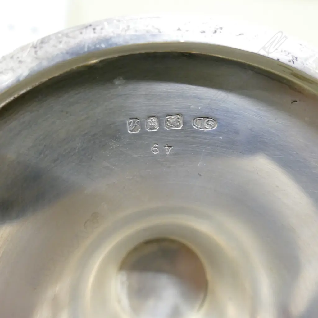 A Stuart Devlin silver and silver gilt four light candelabra Image 1++