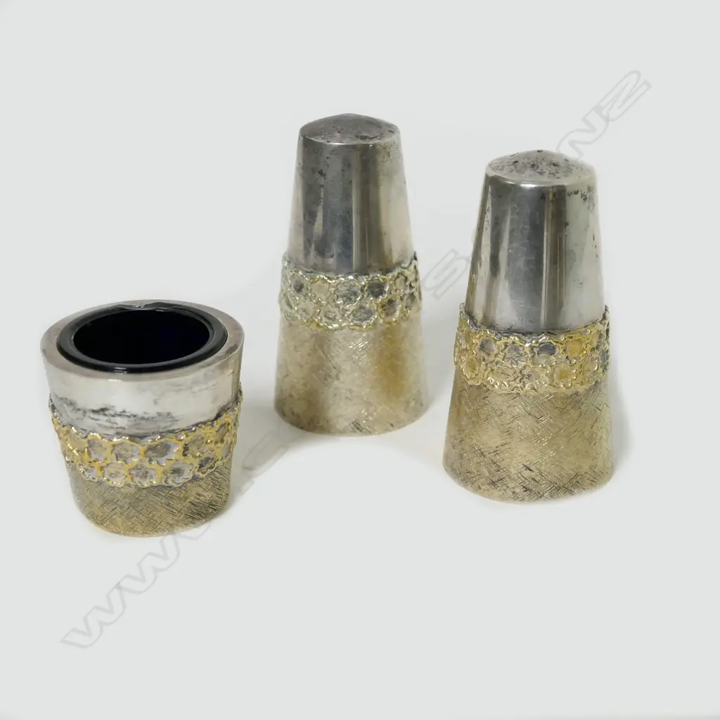 A Stuart Devlin silver and silver gilt condiment set Image 1++