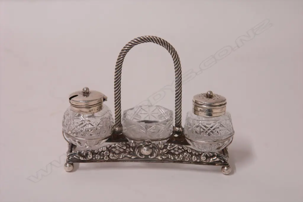 A Victorian silver and cut glass condiment set Image 1++