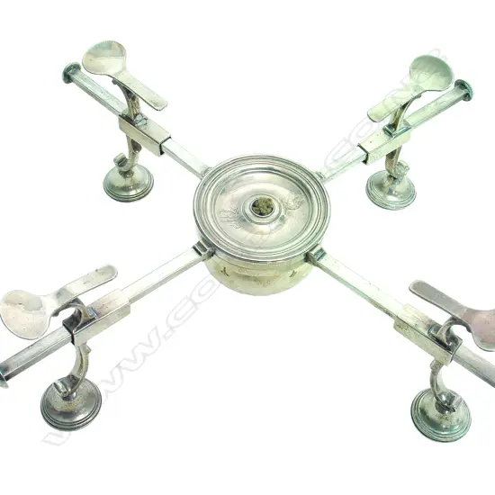 A rare George III silver adjustable warming stand