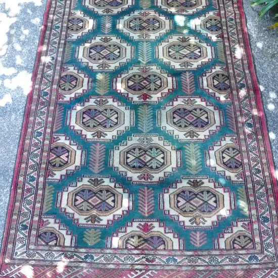 A hand knotted Turkoman tribal rug