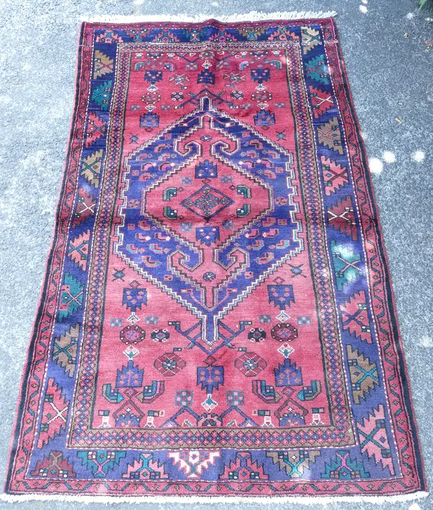 A hand knotted Persian rug Image 1++