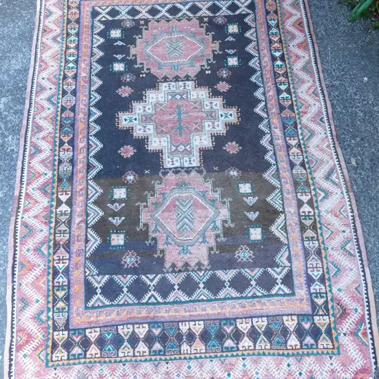 A Persian hand knotted wool on cotton rug