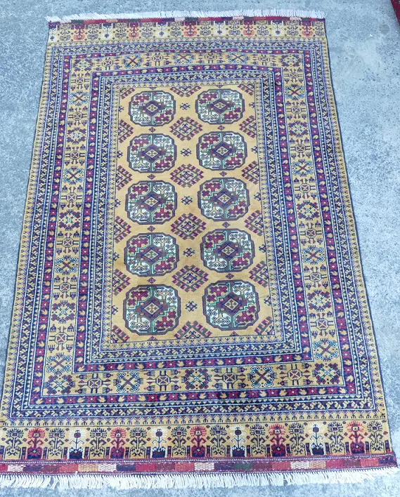 An unusually toned Bukhara rug Image 1++