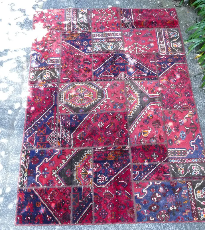 A Persian patchwork rug Image 1++