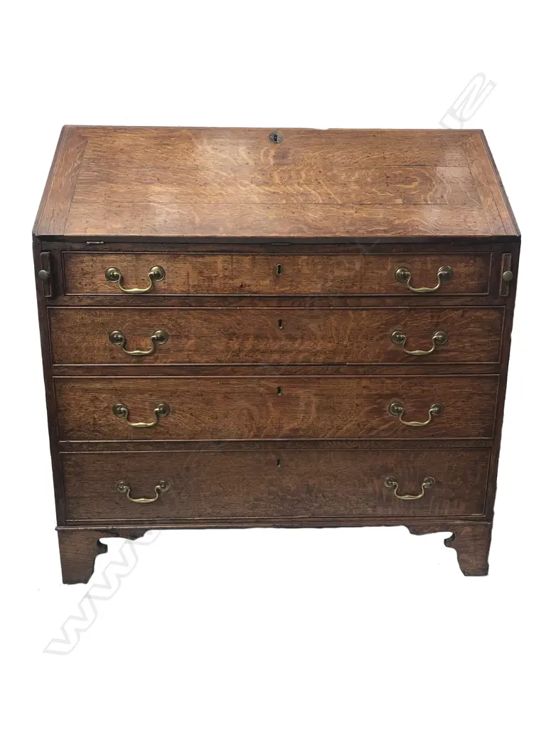 A Georgian oak drop-front bureau Image 1++