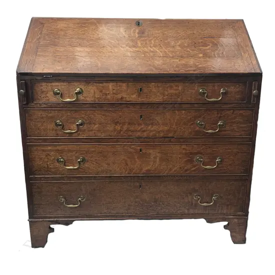 A Georgian oak drop-front bureau