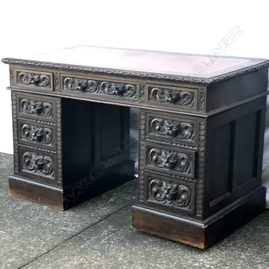 A Victorian oak pedestal desk