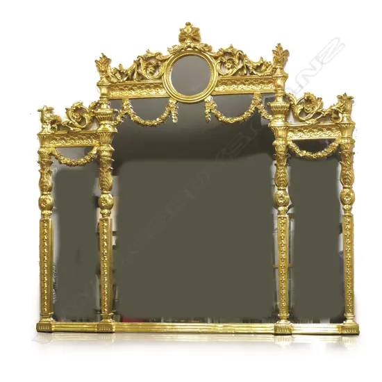 A large modern elaborate mirror of French baroque style